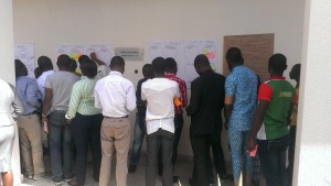Participants using sticky notes to chose what to learn and what to teach